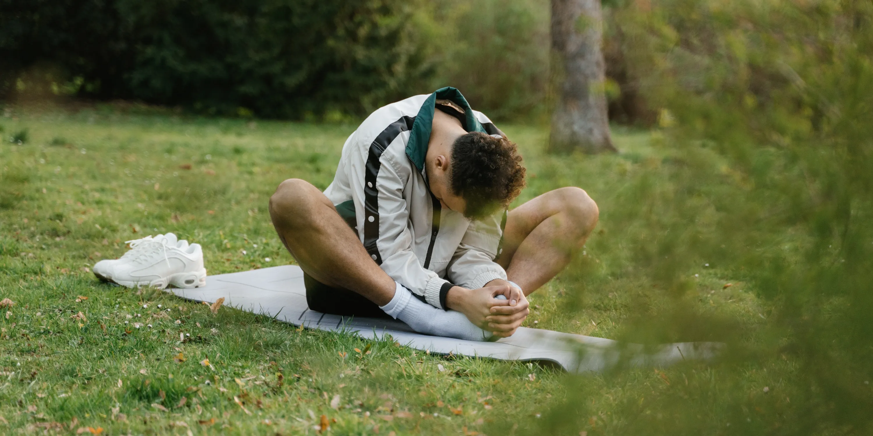 Man practicing yoga for better wellbeing